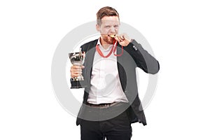 Businessman holding trophy