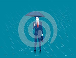 Businessman holding an umbrella. Man standing in rain. Heavy rain, rain, storm. Modern man a stylish suit with elegant umbrella.