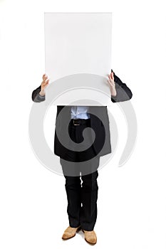 Businessman holding up a blank sign