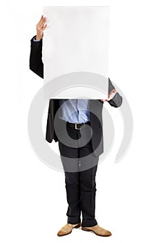 Businessman holding up a blank sign