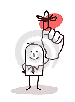 Businessman Holding Up Finger with Reminder Ribbon