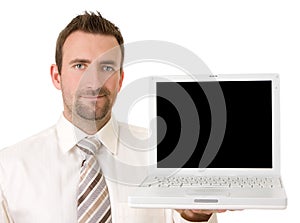 Businessman holding up laptop with clipping path