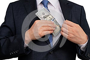 A businessman holding US dollars in hand