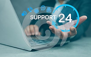 Businessman holding virtual 24 support service icons. Guarantee 24 hour and 7 days. Customer support hotline. Contact us