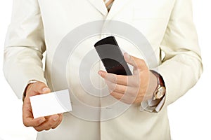 Businessman holding visit card isolated