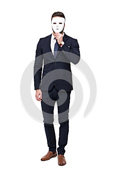 Businessman holding white mask isolated