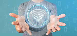 Businessman holding Wifi icon with stats and binary code 3d rendering