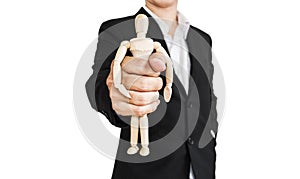 Businessman holding wooden figure, concept of take control, oppress, and etc., isolated on white background
