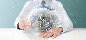 Businessman holding a World globe surronding by ecology icons and connection 3d rendering