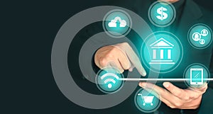 Businessman holdingtablet and interface of online banking