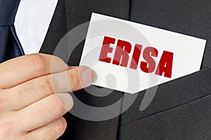 Businessman holds a card with the text - ERISA