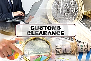 A businessman holds a folder with documents, the text on the folder is - CUSTOMS CLEARANCE