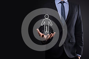 Businessman holds man person icon on dark tone background.HR Human ,people iconTechnology Process System Business with Recruitment