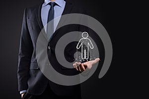 Businessman holds man person icon on dark tone background.HR Human  people iconTechnology Process System Business with Recruitment