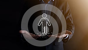 Businessman holds man person icon on dark tone background.HR Human ,people iconTechnology Process System Business with Recruitment