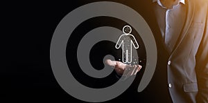 Businessman holds man person icon on dark tone background.HR Human ,people iconTechnology Process System Business with Recruitment