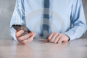 Businessman holds man person icon on dark tone background.HR Human ,people iconTechnology Process System Business with Recruitment