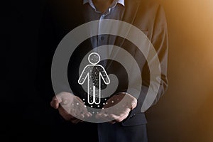 Businessman holds man person icon on dark tone background.HR Human ,people iconTechnology Process System Business with Recruitment