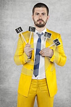 Businessman holds a sign HELP