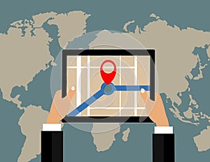 Businessman holds tablet and world map with location pointer