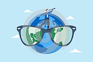 Businessman holds telescope while standing on world map eyeglasses, illustrating global business vision