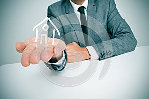 Businessman and house