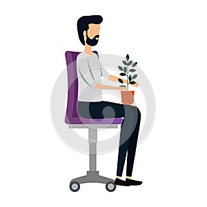 businessman with houseplant seated in office chair