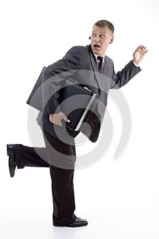Businessman in hurry with briefcase