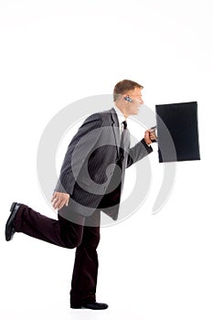 Businessman in hurry with briefcase