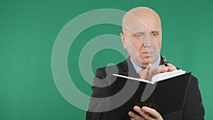 Businessman Image Using Agenda With Green Screen Background