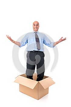 Businessman inside a box