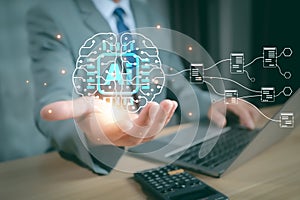 Businessman interact with AI artificial intelligence brain processor in concept of AI artificial intelligence engineering, big