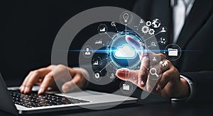 Businessman interacting with cloud computing network and data storage