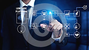 Businessman Interacting with Digital Low Code Platform Interface for Software Development and Workflow Automation Quark