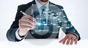 Businessman interacting with futuristic digital network display for advanced technology concepts