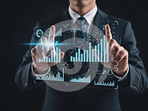 Businessman interacting with virtual data visualization interface for business analysis