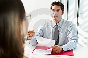 Businessman Interviewing Female Candidate