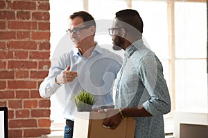 Businessman introduce black newcomer to company team