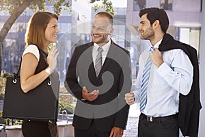 Businessman introducing new partner to colleague photo