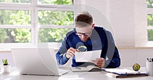 Businessman Investigation Finance Using Magnifying Glass