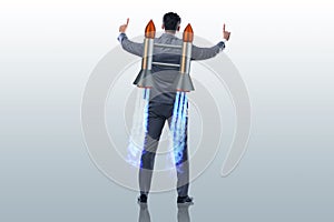 The businessman with jet pack in business concept