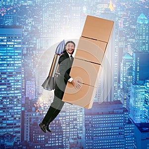 Businessman with jetpack delivering boxes globally