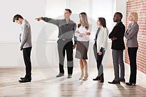 Businessman Judged By His Colleague photo