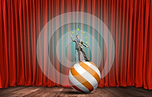 Businessman juggling with balls