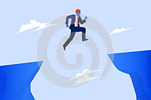 Businessman jump through the gap obstacles between hill to success. Business risk and success concept