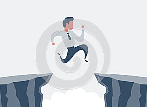 Businessman jump over cliff gap, overcome the difficulty. Business concept