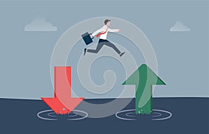 Businessman jump from red pointing down arrow to green rising up. Saving and investment or stock market rebound and economic