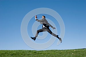 Businessman jumping