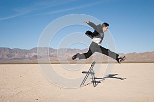 Businessman jumping