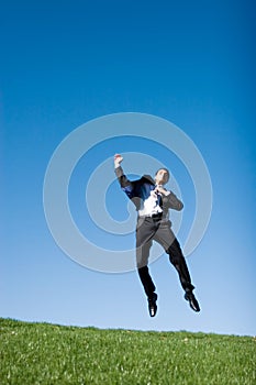 Businessman jumping